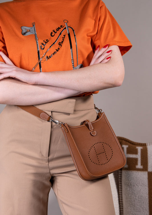 Hermès - Mini Evelyne in Gold