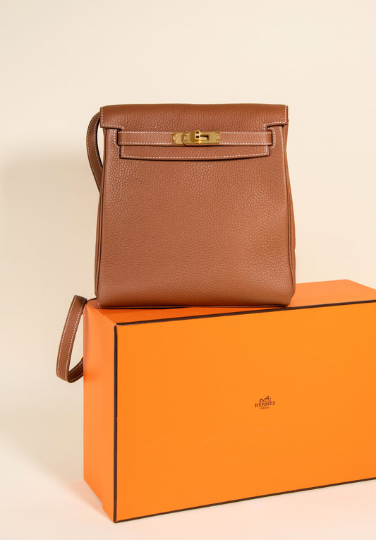 Hermès - Taurillon Clemence Kelly Ado Backpack in Gold GHW