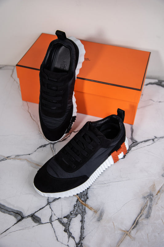 Hermès Bouncing Sneakers in Black/White/Orange