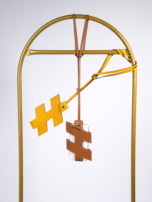 Hermès H-Tag Phone Case in Jaune Ambre & Gold