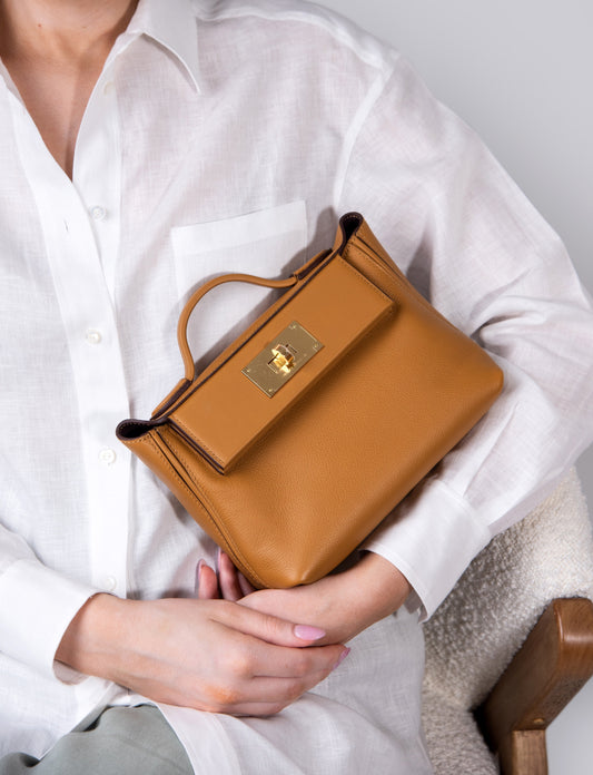 Hermès 24/24 Caramel/Sesame in GHW
