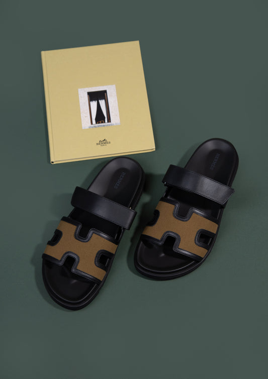 Hermès Chypre Sandals in Kaki/Noir
