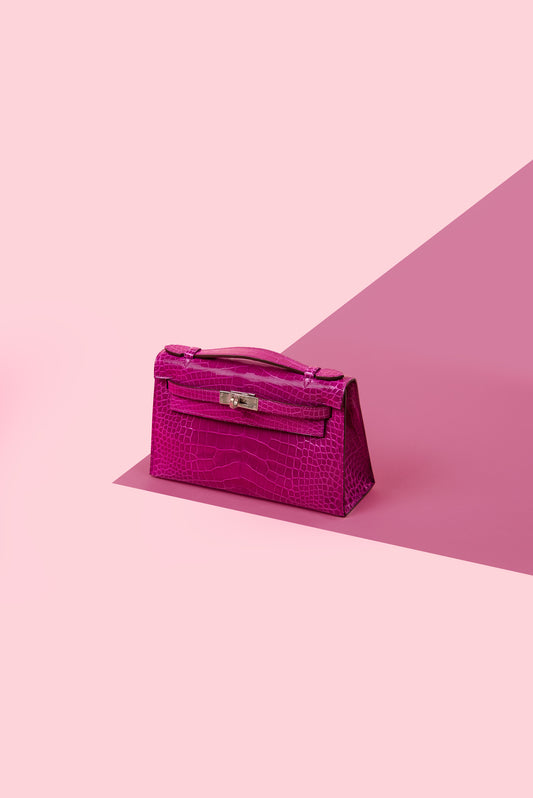 Hermès Kelly Pochette Shiny Crocodile in Rose Sheheraza PHW