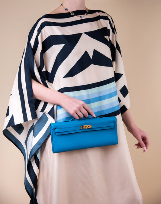 Hermès Kelly Cut in Blue GHW with Van Cleef & Arpels Blue Agate Necklace