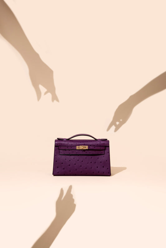 Hermès - Kelly Pochette in Ostrich Anemone Permabrass Hardware