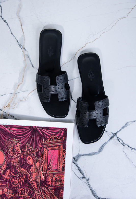 Hermès Limited Edition Black Oran Sandals