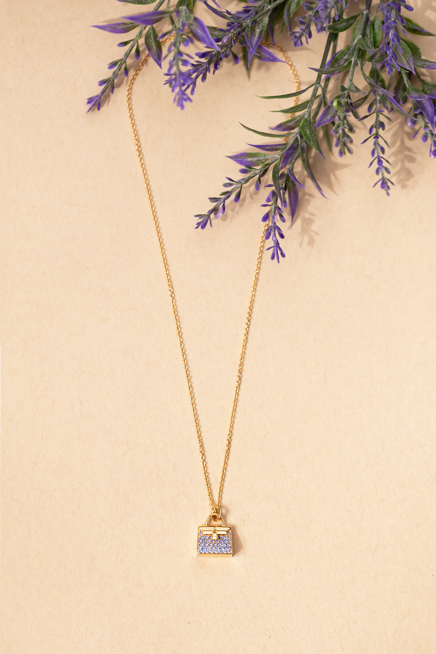 Hermès Amulettes Kelly Pendant in Rose Gold/Blue Sapphire