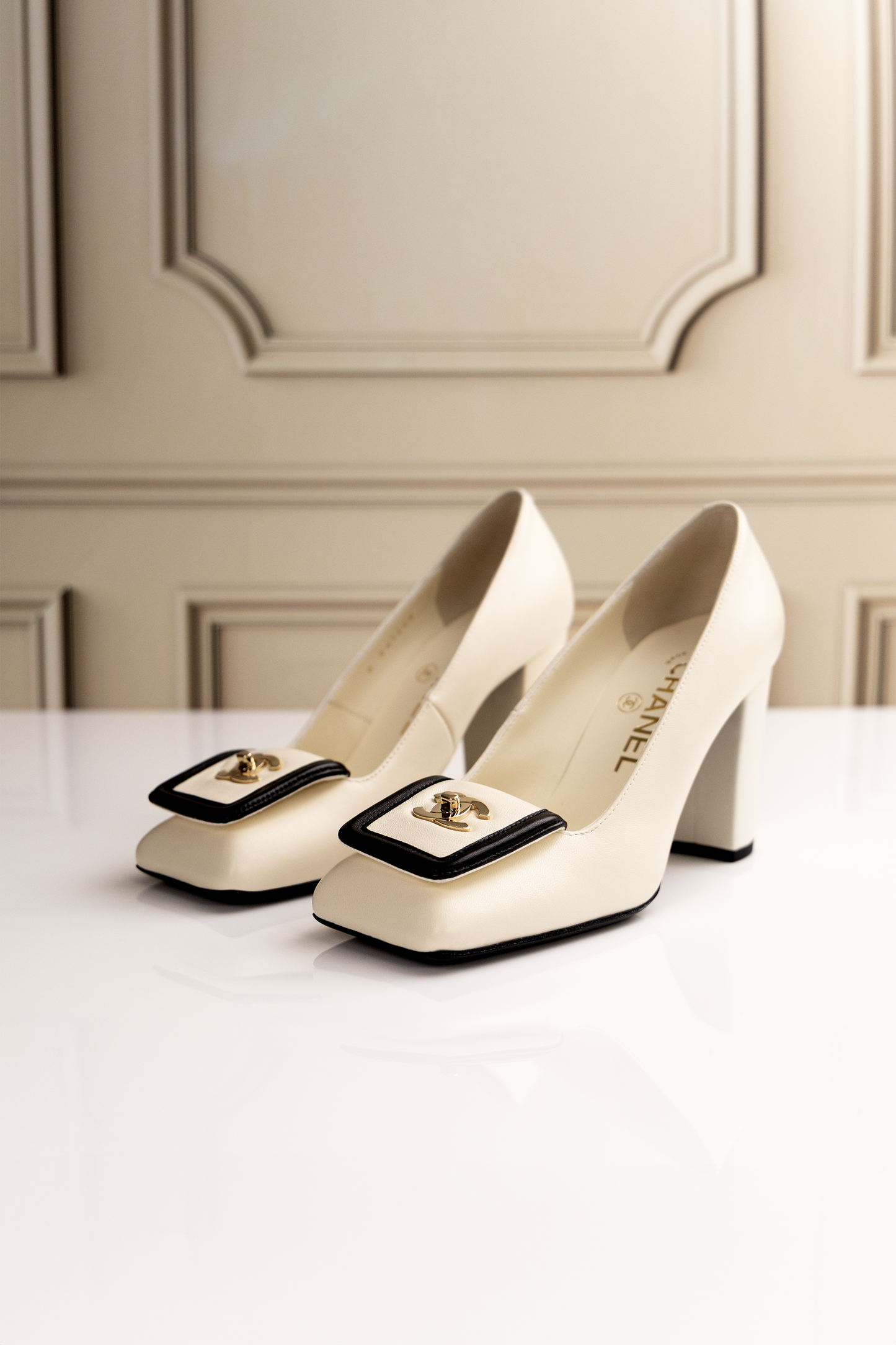 Chanel CC Ivory Leather Pumps