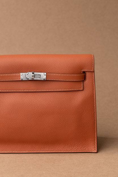 Hermès Kelly Danse Shoulder Crossbody in Blush PHW