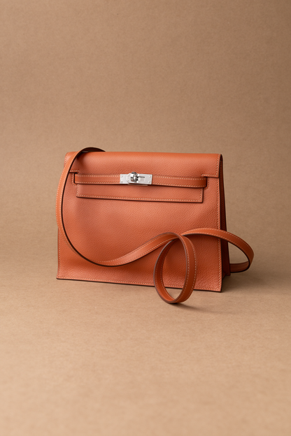 Hermès Kelly Danse Shoulder Crossbody in Blush PHW