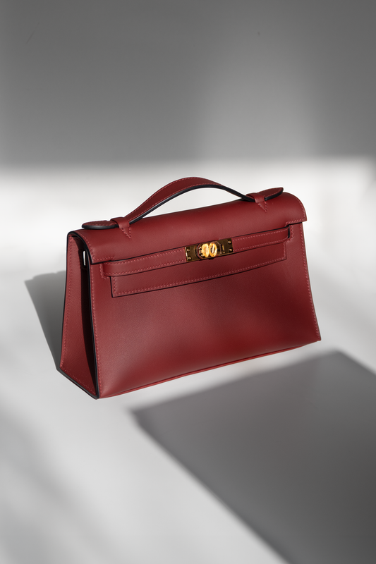 Hermès Kelly Pochette Swift in Rouge H GHW