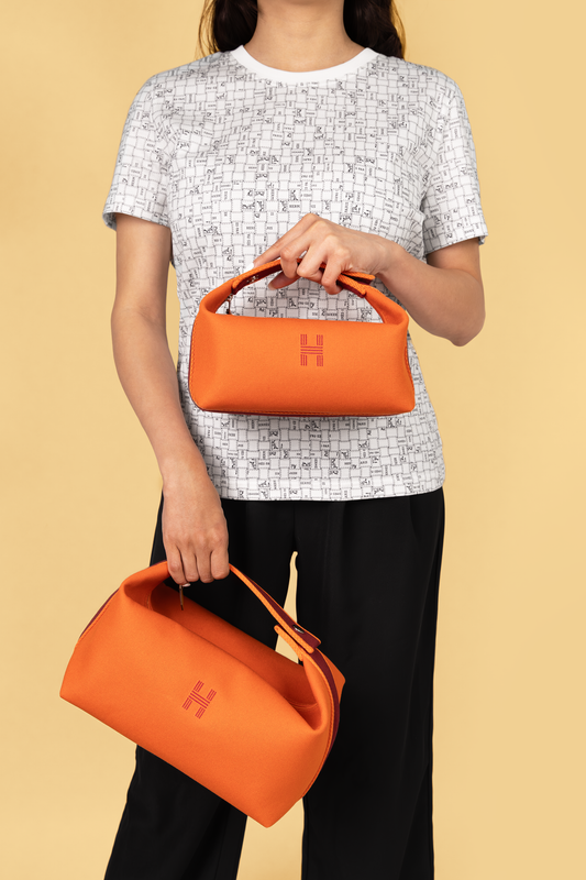 Hermès Bride-a-Brac Orange Pouches in Small & Large