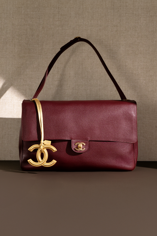 Chanel Maxi Flap Bag in Burgundy with Gold CC Charm