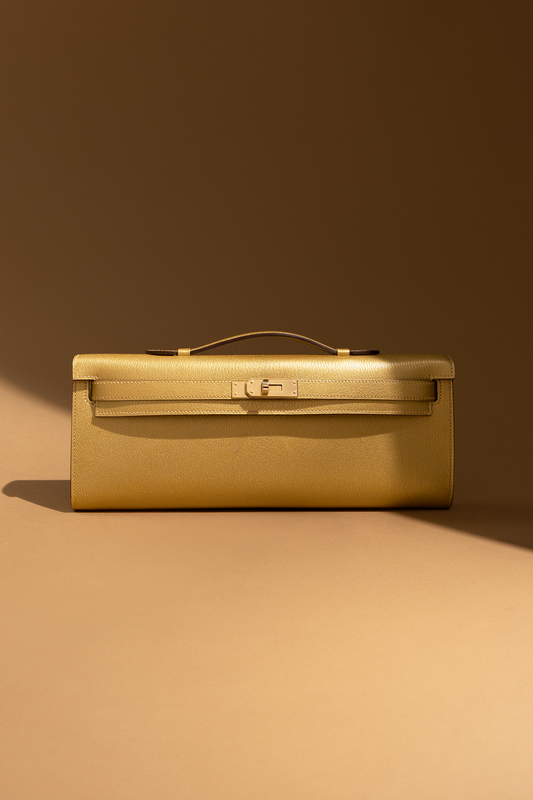 Hermès Kelly Cut Clutch in Chamkilight Dore GHW