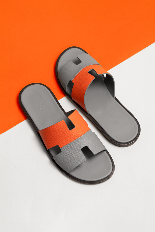 Hermès Izmir Sandals in Orange/Gray
