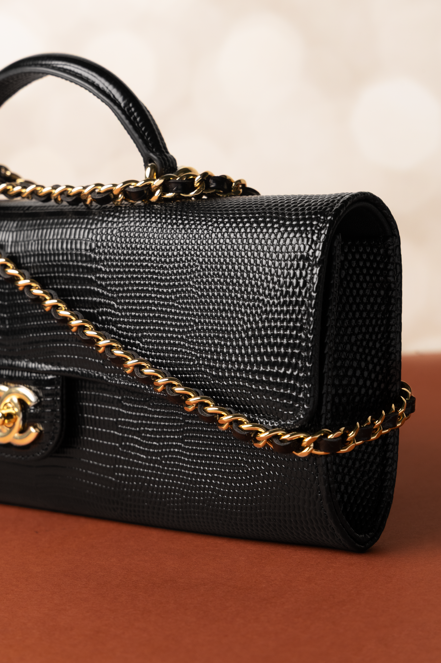 Chanel Clutch with Top Handle & Chain in Black Lizard
