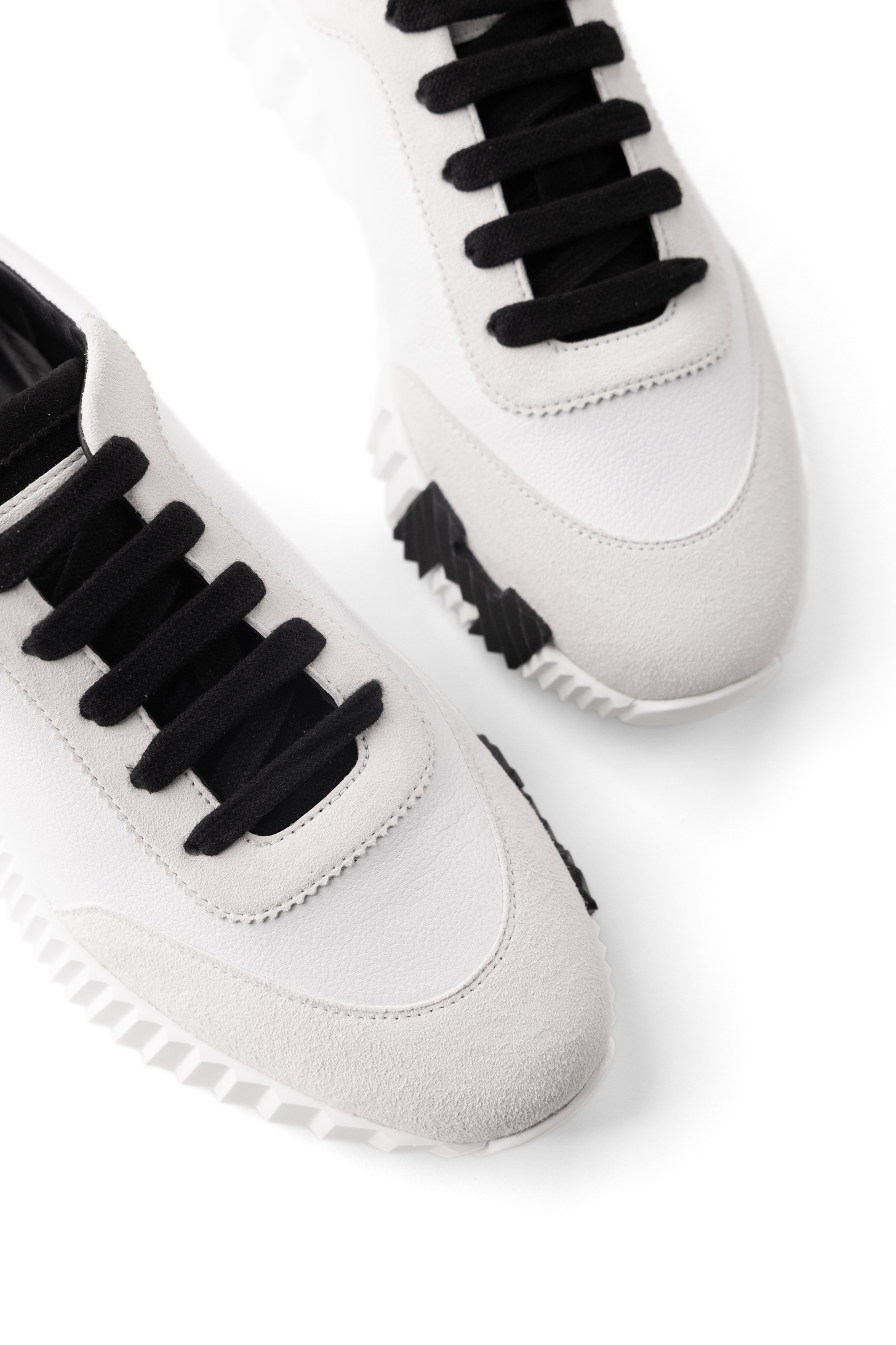 Hermès Bouncing Sneakers in White/Black H