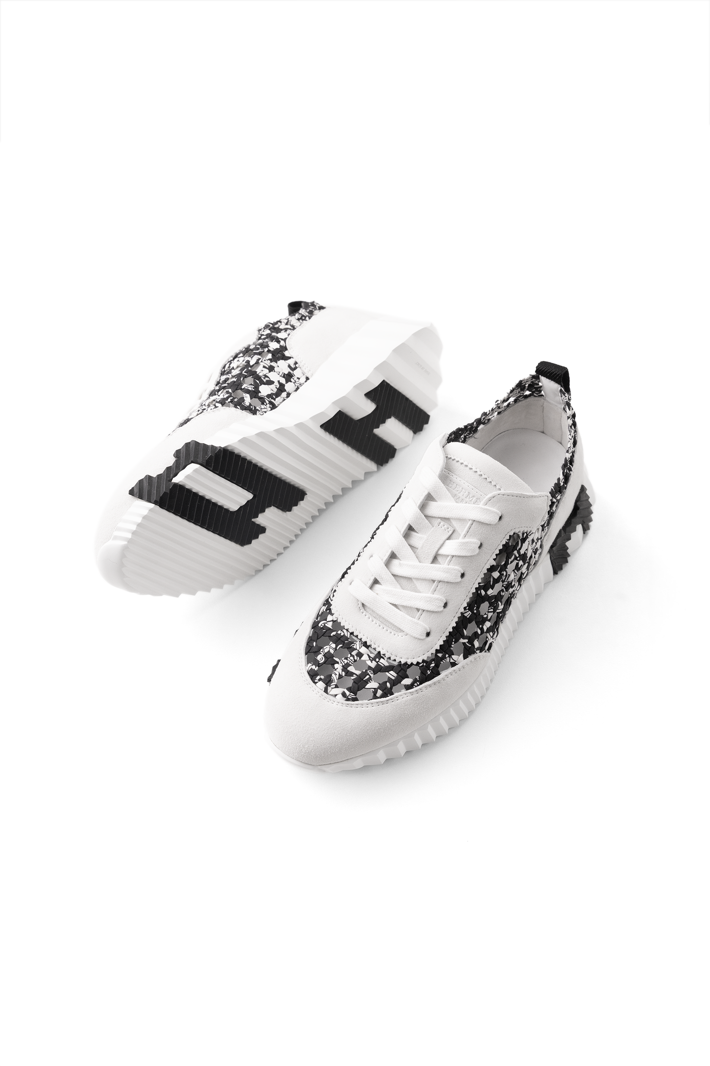 Hermès Braided Silk Suede Bouncing Sneakers in White/Black