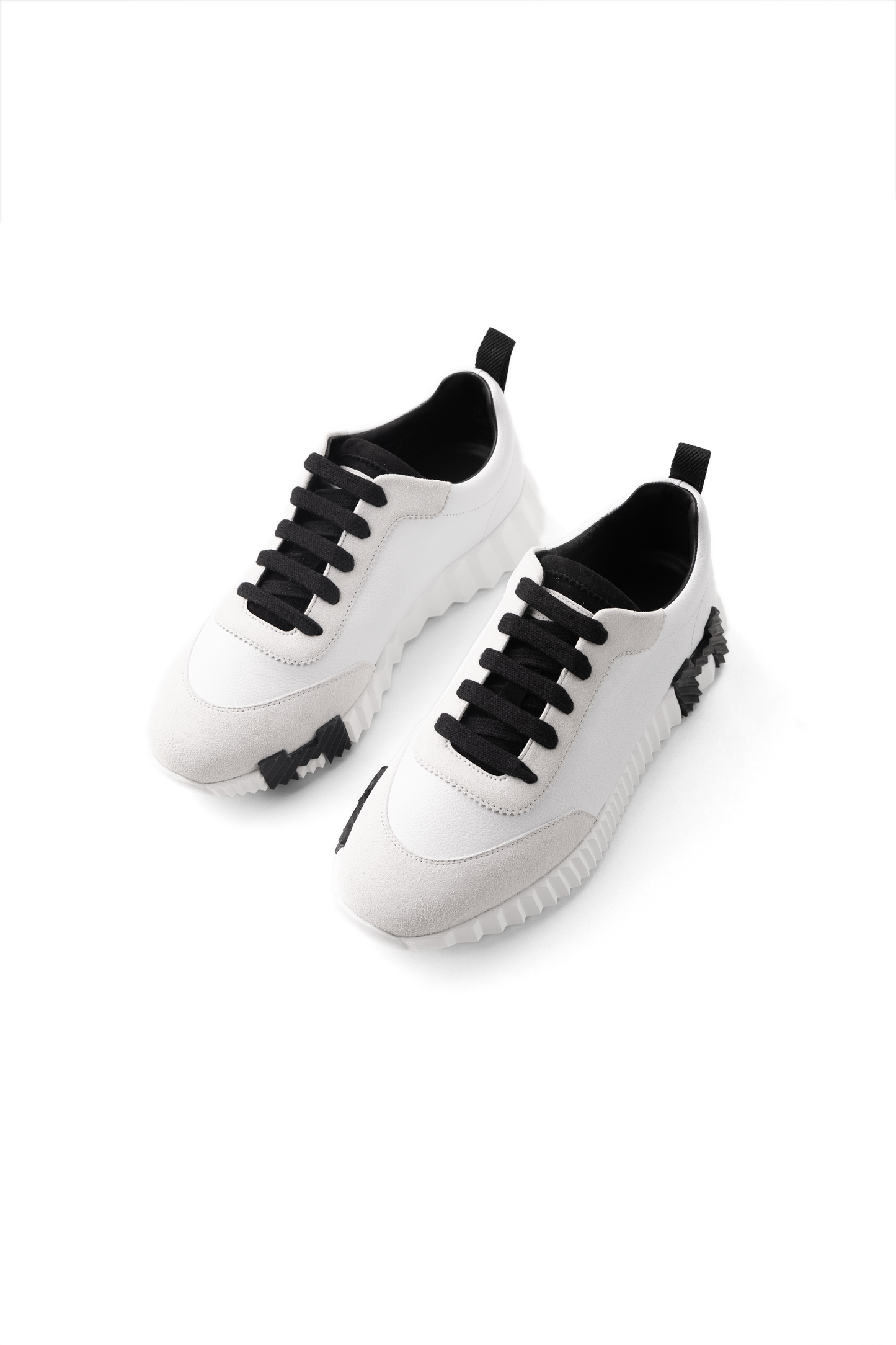 Hermès Bouncing Sneakers in White/Black H