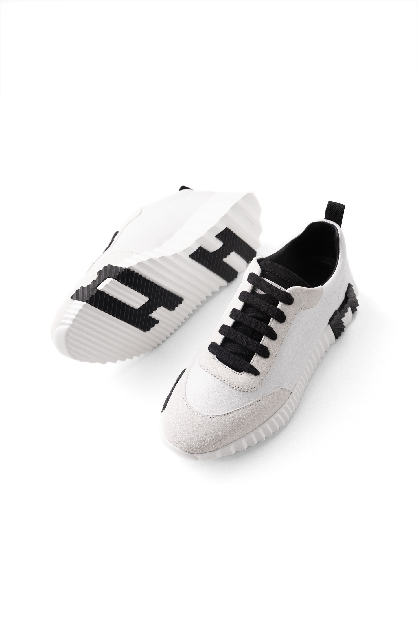 Hermès Bouncing Sneakers in White/Black H