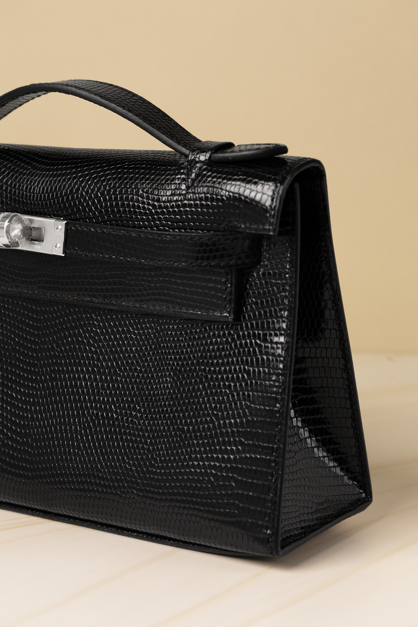 Hermès Kelly Pochette Black Lizard PHW