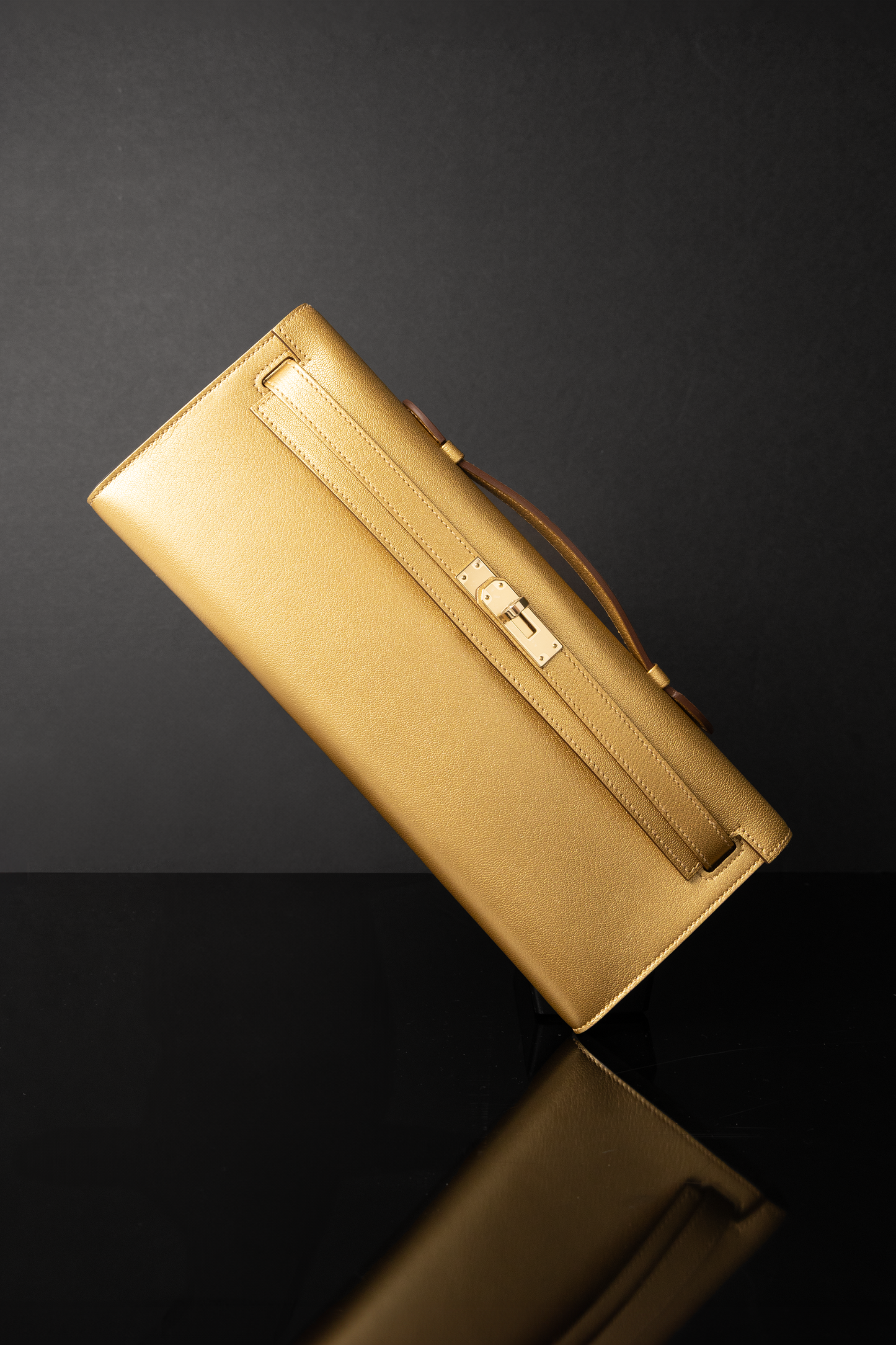 Hermès Kelly Cut Clutch in Chamkilight Dore GHW