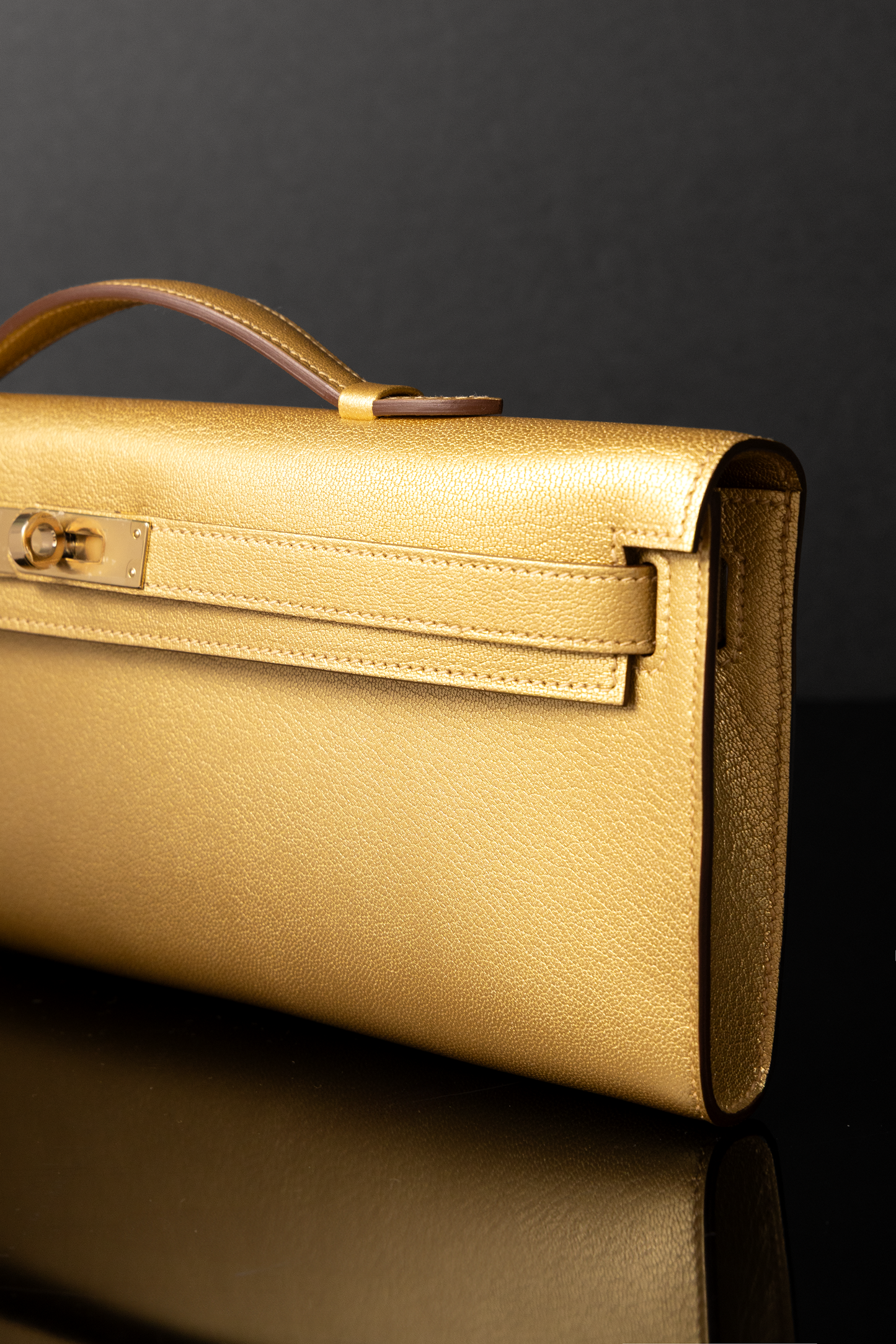 Hermès Kelly Cut Clutch in Chamkilight Dore GHW