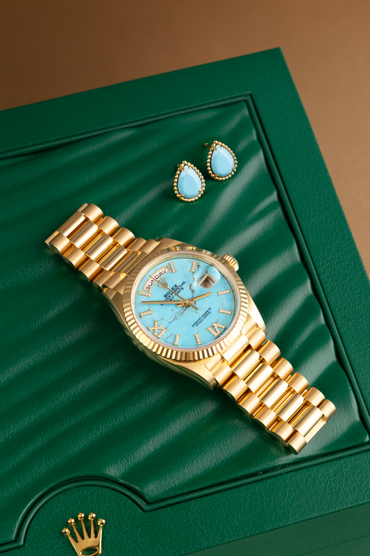 Rolex Day Date 36mm in Yellow Gold with Turquoise Dial & Boucheron Serpent Boheme Stud Earrings