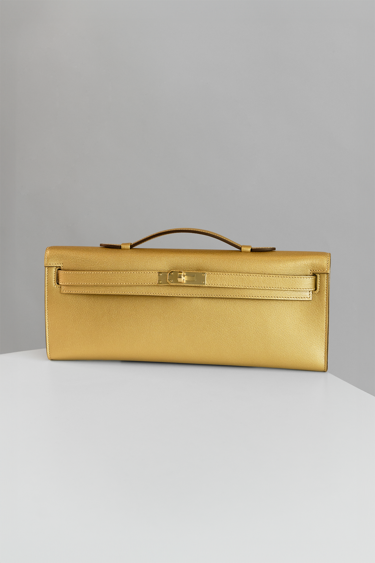 Hermès Kelly Cut Goatskin Clutch in Chamkilight Dore GHW
