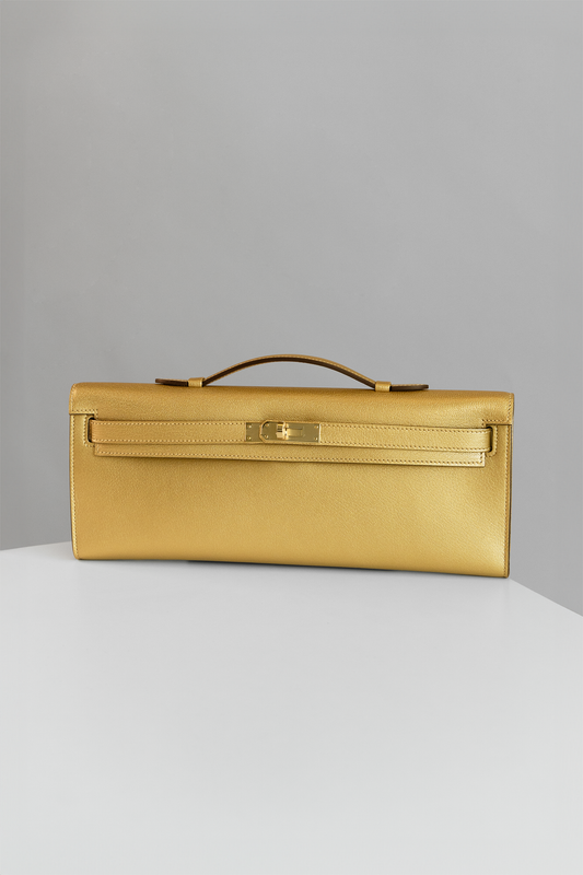 Hermès Kelly Cut Goatskin Clutch in Chamkilight Dore GHW