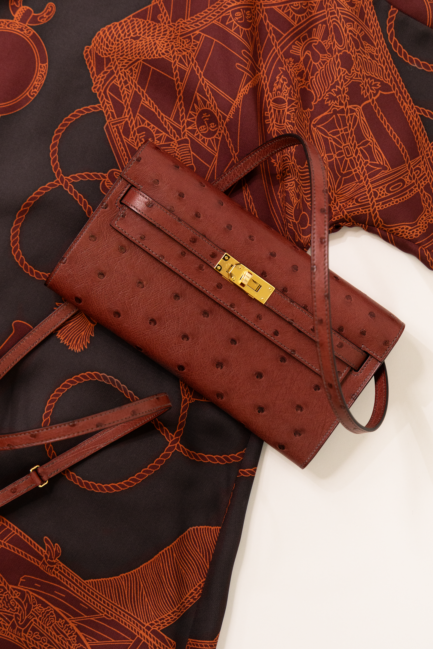 Hermès Kelly Wallet To Go Ostrich in Rouge H GHW