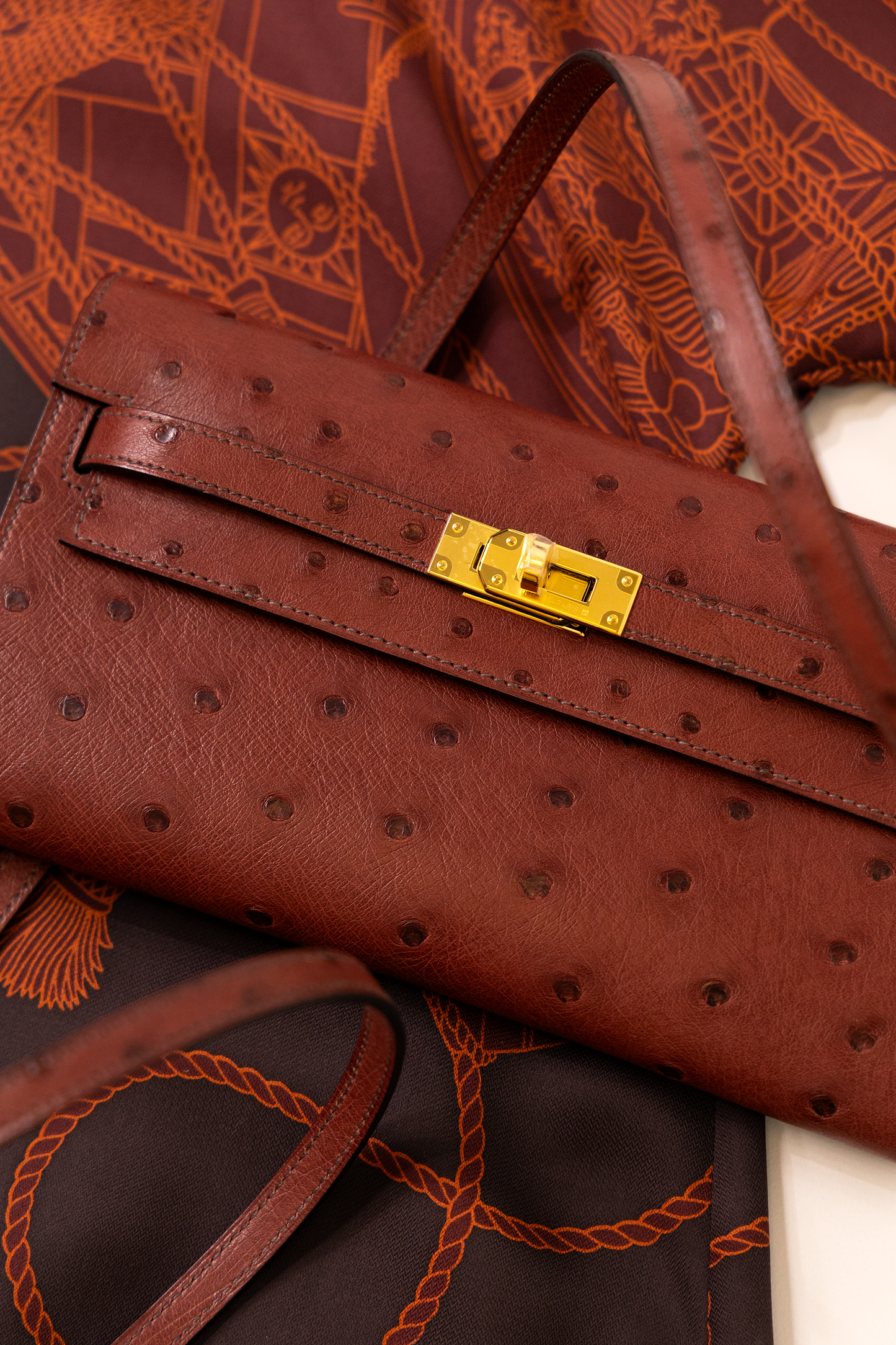 Hermès Kelly Wallet To Go Ostrich in Rouge H GHW
