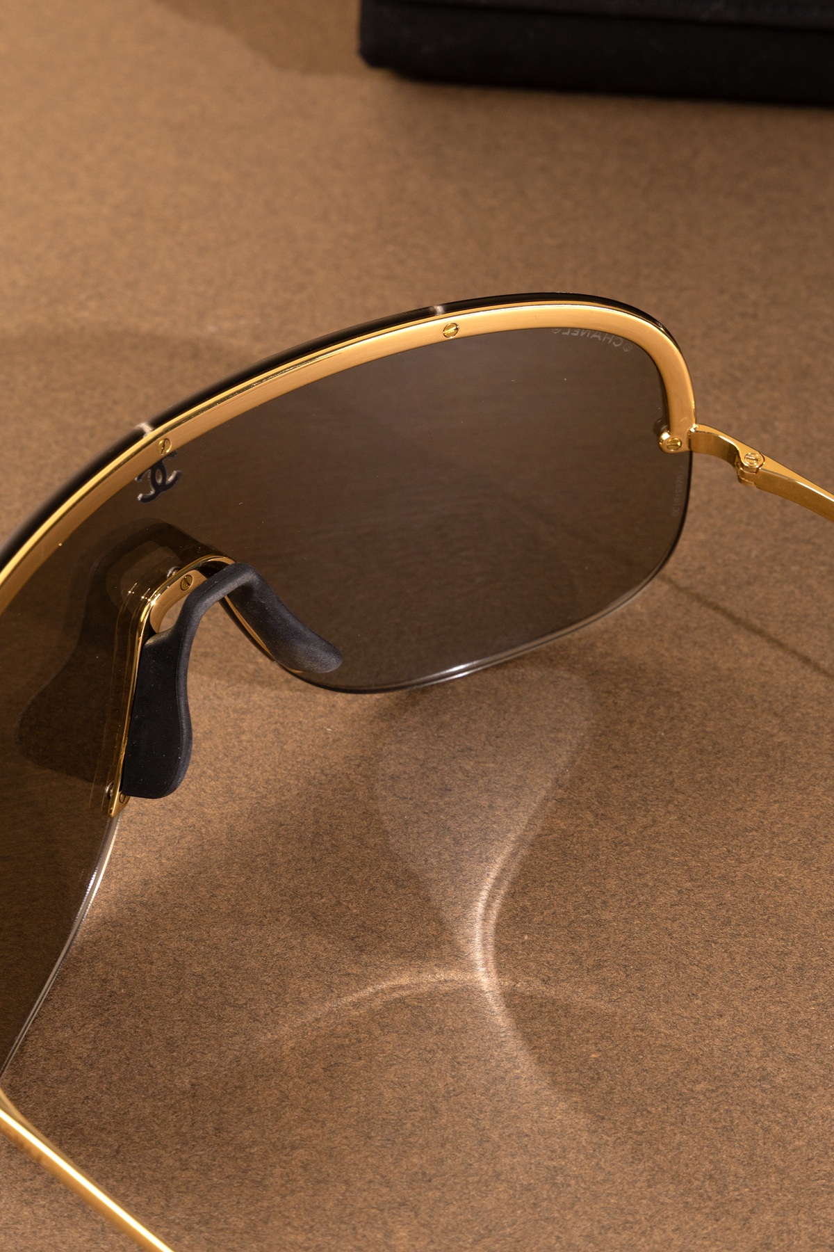 Chanel Shield Sunglasses in Gold/Silver
