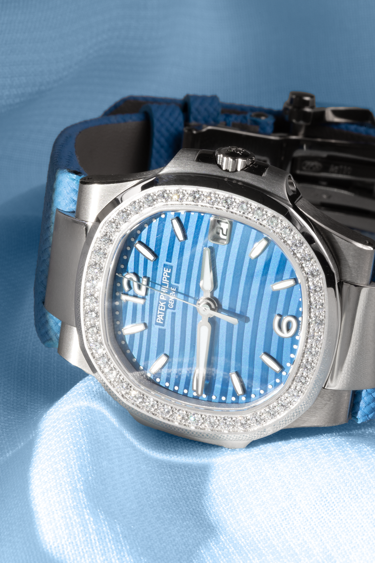 Patek Philippe Nautilus 7010G-013 in White Gold/Azure Blue Wave-Pattern Dial with a Diamond-Set Bezel