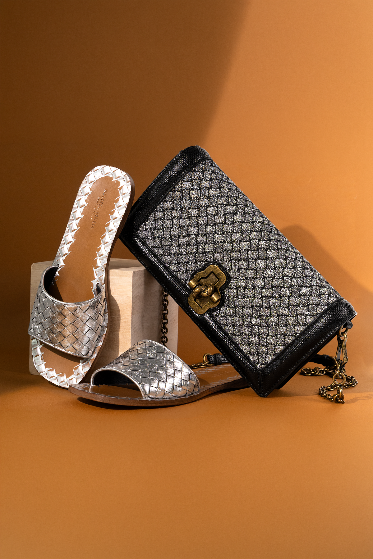 Bottega Veneta Intrecciato Olimpia Knot Clutch in Black/Grey & Silver Sandals