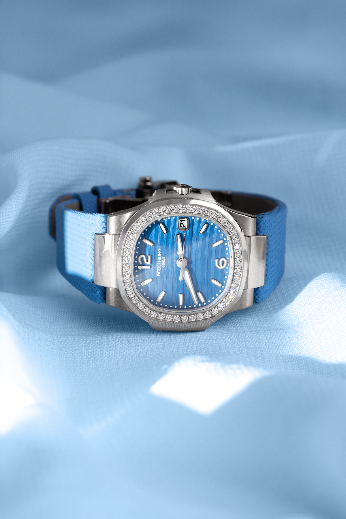 Patek Philippe Nautilus 7010G-013 in White Gold/Azure Blue Wave-Pattern Dial with a Diamond-Set Bezel